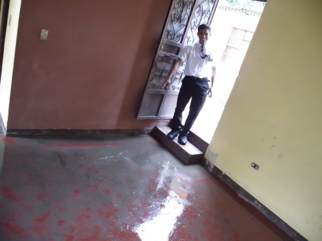 Here is a photo of Elder Brito and our new flooded house =) We got there and EVERYTHING was soaked. We spent the whole day, (the ZLs too, awesome of them) cleaning and drying.